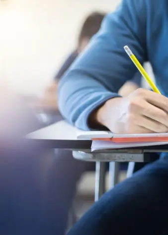 Students sitting exam paper